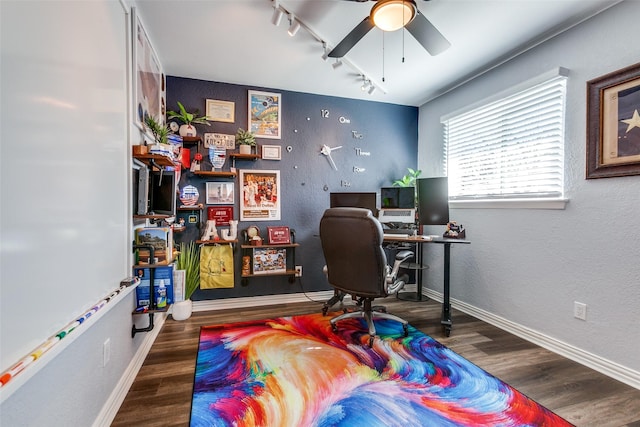 office space featuring wood-type flooring, ceiling fan, and rail lighting