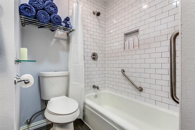 bathroom featuring toilet and shower / bath combination with curtain