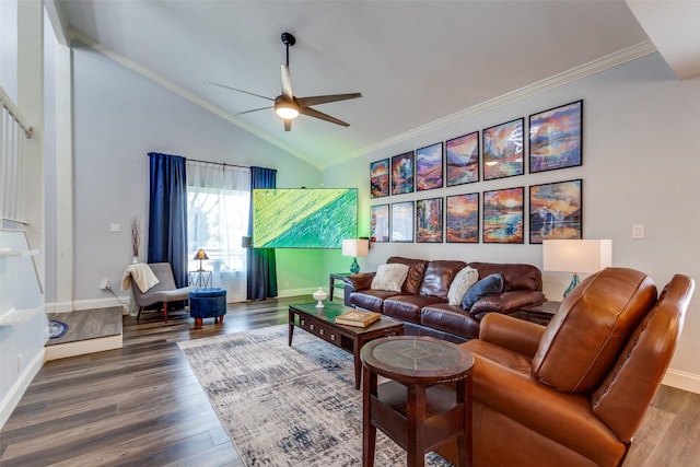 living room featuring ornamental molding, ceiling fan, vaulted ceiling, and dark hardwood / wood-style floors