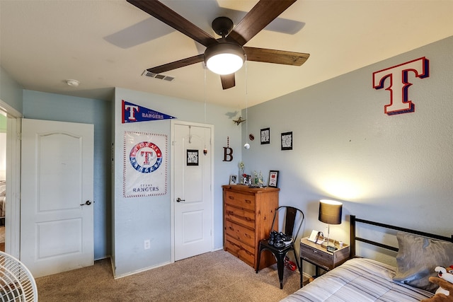 bedroom with light colored carpet and ceiling fan