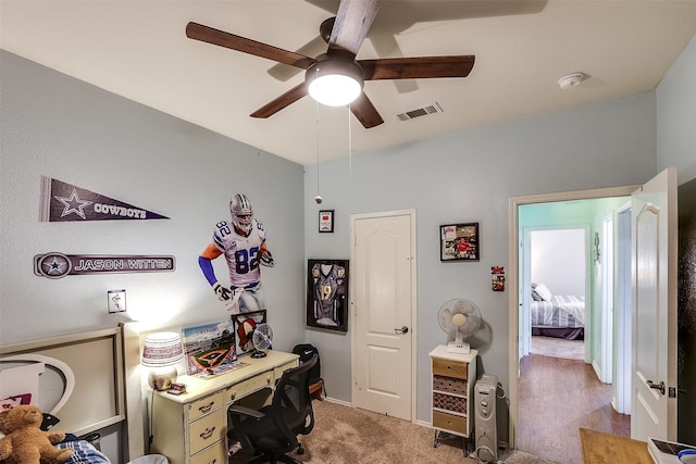 office featuring ceiling fan and carpet flooring