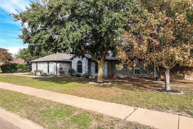 view of front of home with a front yard