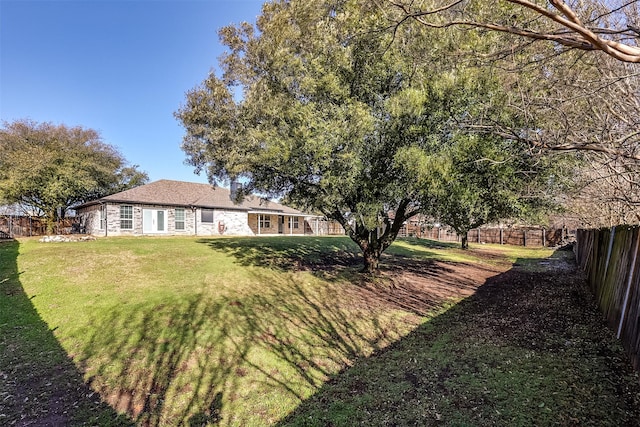 view of yard featuring a fenced backyard