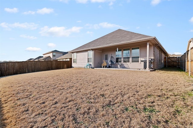 back of property featuring a patio