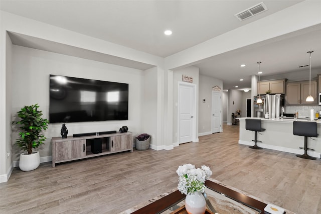 living room with light wood-type flooring