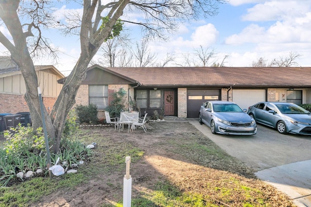 ranch-style house featuring a garage