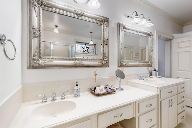 bathroom with a shower with door, crown molding, and vanity