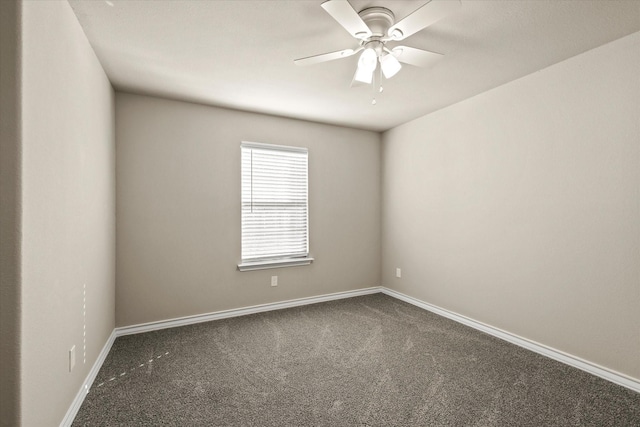 unfurnished room with ceiling fan and carpet flooring