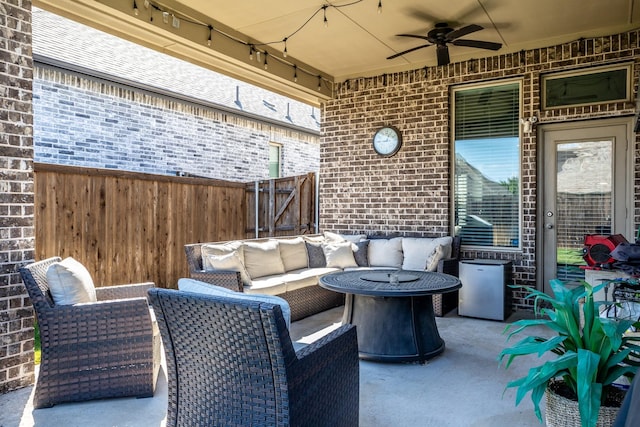 view of patio with ceiling fan and outdoor lounge area