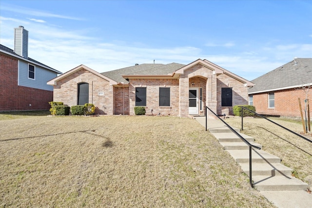 view of front of house with a front lawn