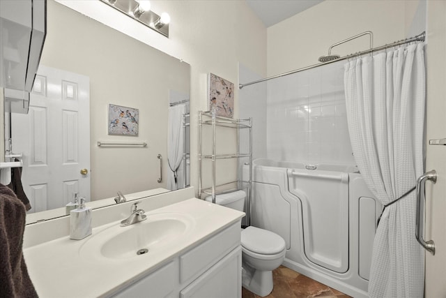 full bathroom featuring shower / tub combo with curtain, vanity, and toilet