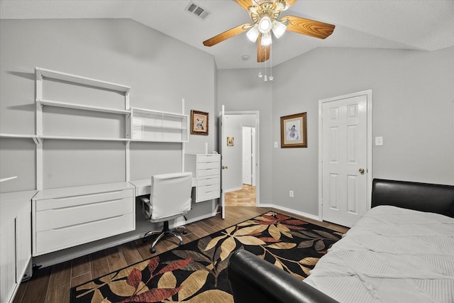 bedroom with lofted ceiling, hardwood / wood-style flooring, and ceiling fan