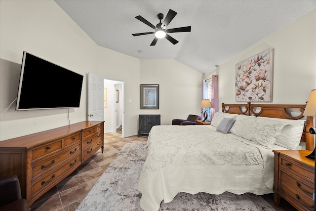 bedroom with lofted ceiling and ceiling fan