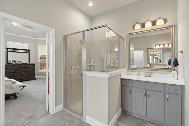 bathroom with an enclosed shower and vanity