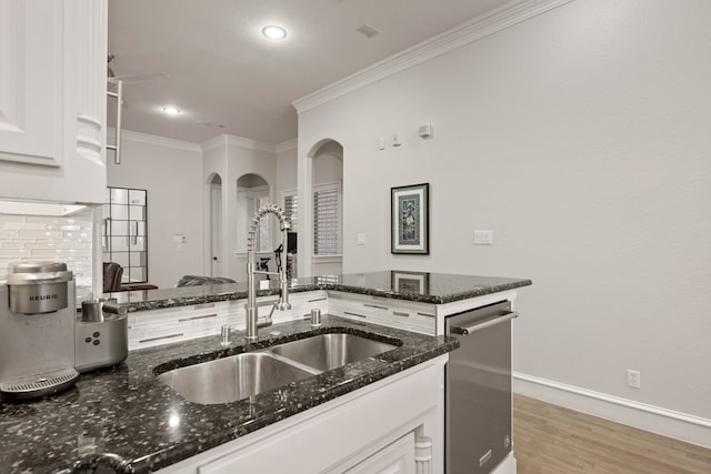 bathroom with toilet, hardwood / wood-style flooring, and sink