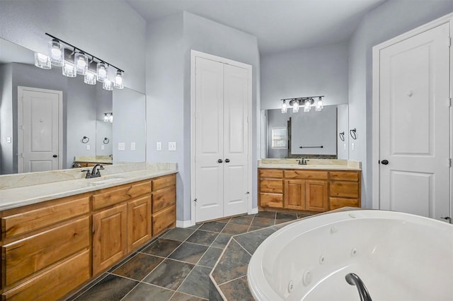 bathroom with a relaxing tiled tub and vanity