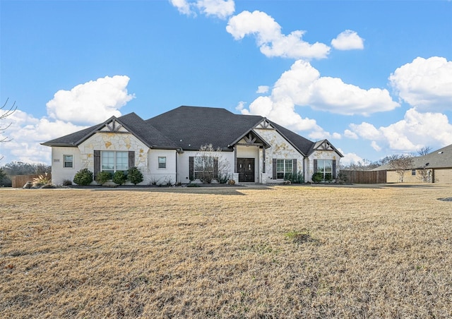 view of front of property with a front lawn