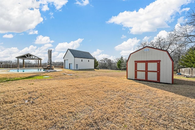 view of yard featuring a storage shed and a gazebo