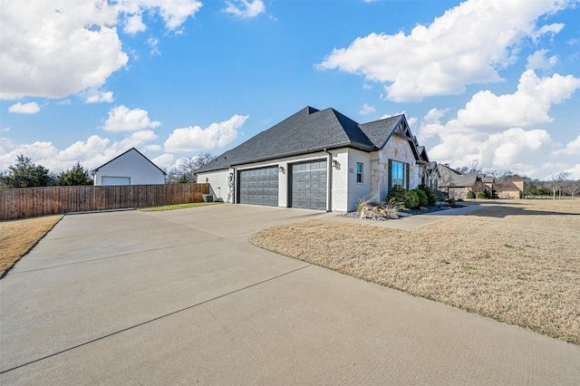 view of property exterior featuring a garage