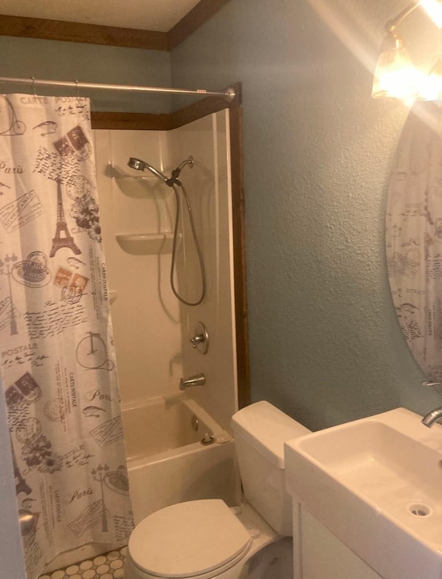 full bathroom featuring toilet, vanity, and shower / bath combo with shower curtain