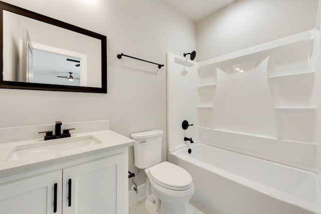 full bathroom with toilet, ceiling fan, bathing tub / shower combination, and vanity