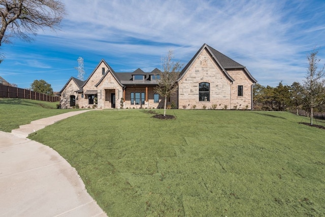 view of front of home featuring a front lawn