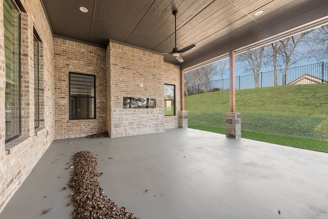 view of patio featuring ceiling fan