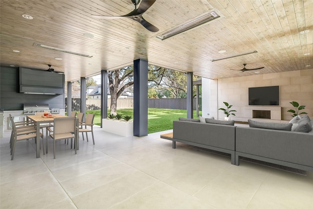 view of patio / terrace featuring ceiling fan, area for grilling, and outdoor lounge area