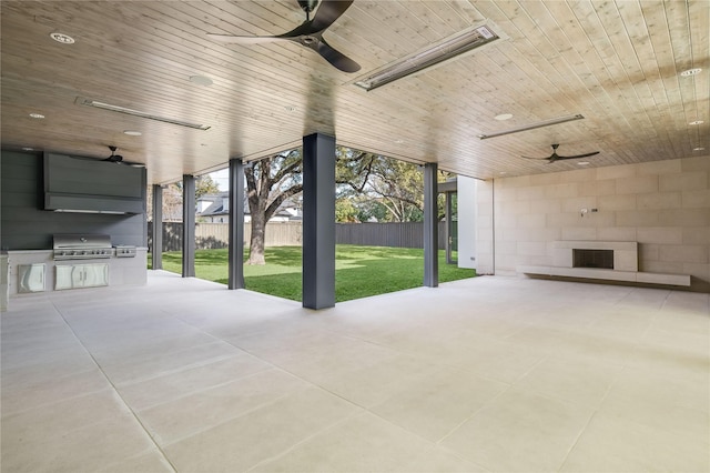 view of patio / terrace with ceiling fan and area for grilling