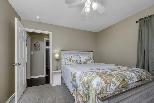 bedroom with ceiling fan and carpet flooring