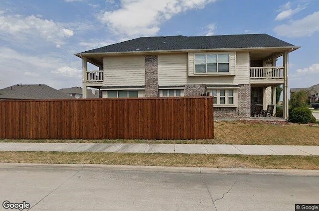 exterior space with a balcony