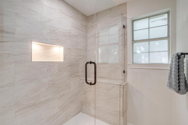 bathroom featuring an enclosed shower