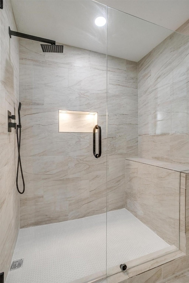 bathroom featuring walk in shower