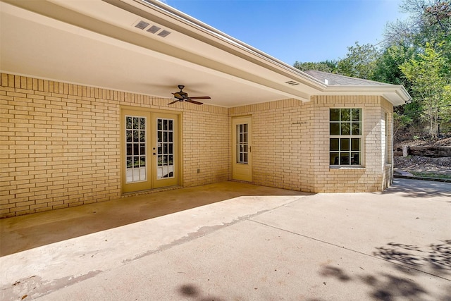 view of patio featuring french doors and ceiling fan