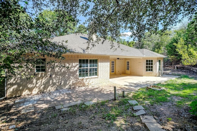 back of property featuring a patio