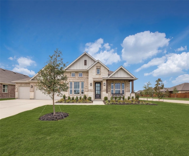 craftsman house with a porch, a front lawn, and a garage