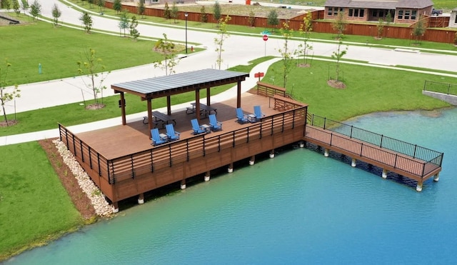 dock area with a gazebo and a water view