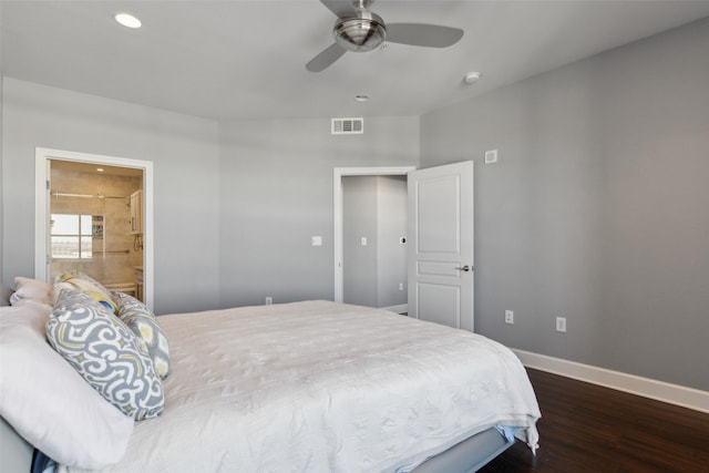 bedroom featuring dark hardwood / wood-style flooring, connected bathroom, and ceiling fan