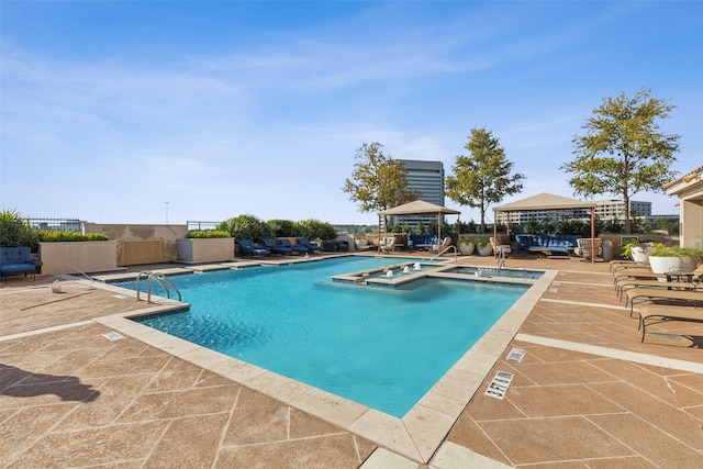 view of swimming pool with a community hot tub, a gazebo, and a patio