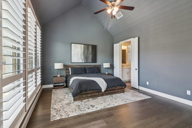 bedroom with ceiling fan, dark hardwood / wood-style flooring, ensuite bathroom, and high vaulted ceiling