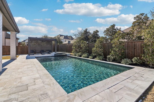 view of swimming pool with a pool with connected hot tub, a fenced backyard, and a patio