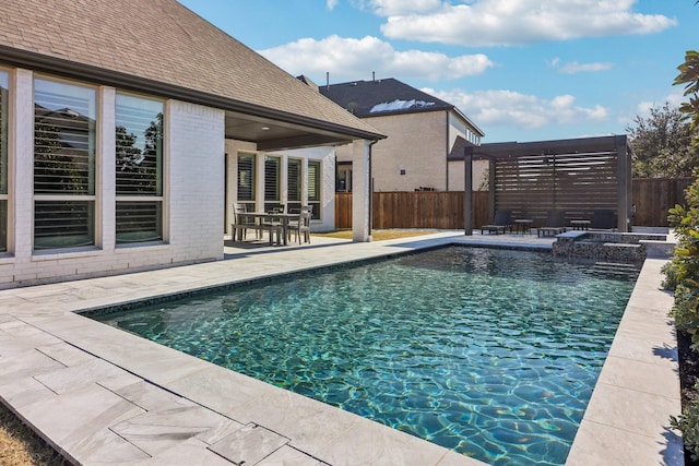 view of swimming pool with a patio, fence, and a fenced in pool