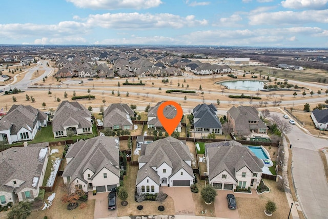 drone / aerial view with a residential view