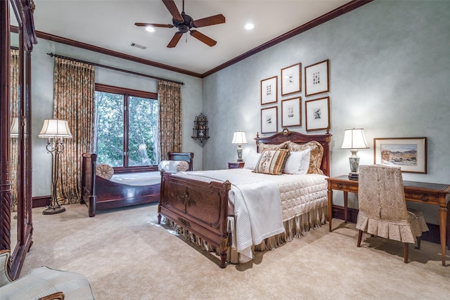 bedroom with ornamental molding, ceiling fan, and light carpet