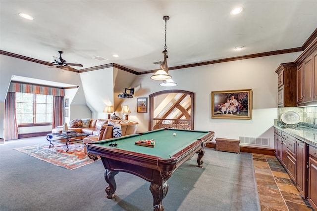 game room with vaulted ceiling, billiards, ceiling fan, ornamental molding, and dark carpet