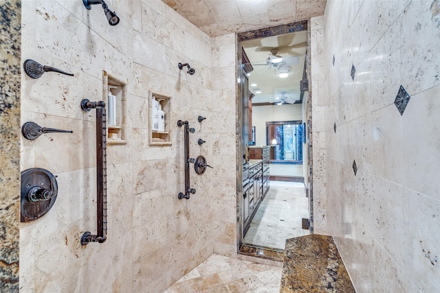 bathroom with a tile shower