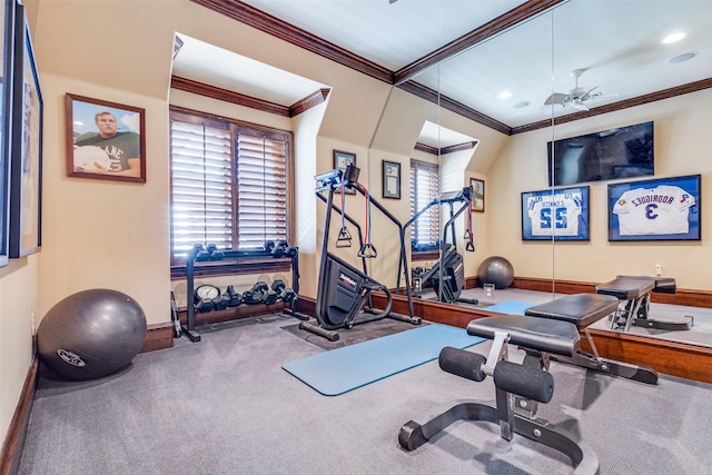 workout area featuring carpet floors, ceiling fan, and crown molding