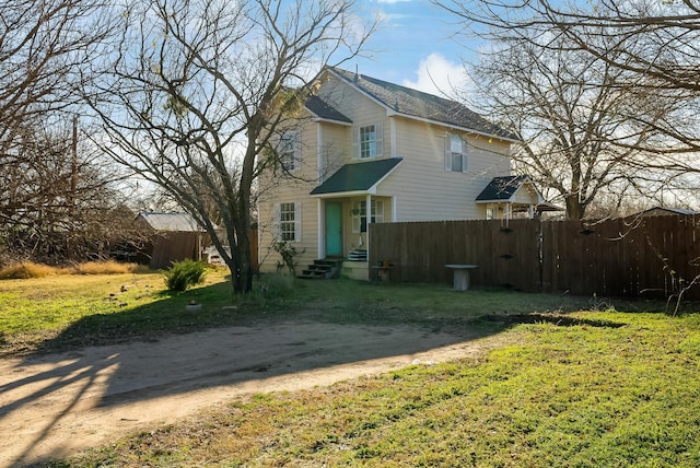 exterior space featuring a lawn