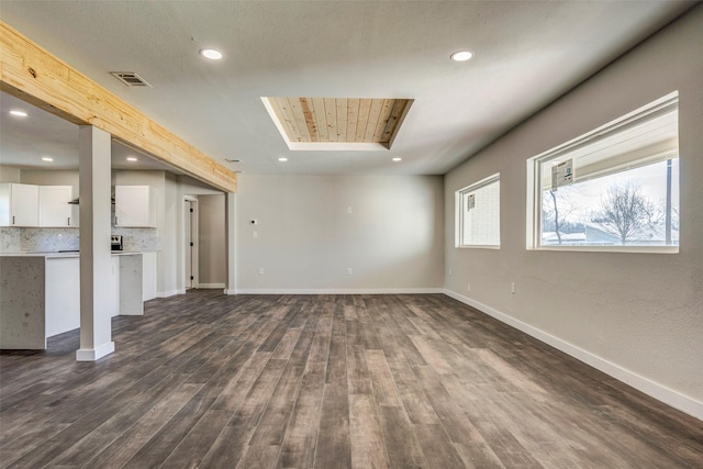6809 Park Place Dr, Richland Hills, TX 76118 - unfurnished living room featuring recessed lighting, baseboards, and dark wood finished floors