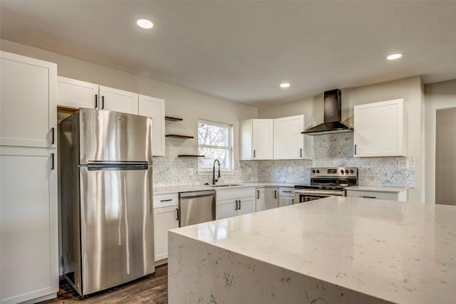 6809 Park Place Dr, Richland Hills, TX 76118 - kitchen featuring hanging light fixtures, a sink, white cabinets, stainless steel appliances, and recessed lighting